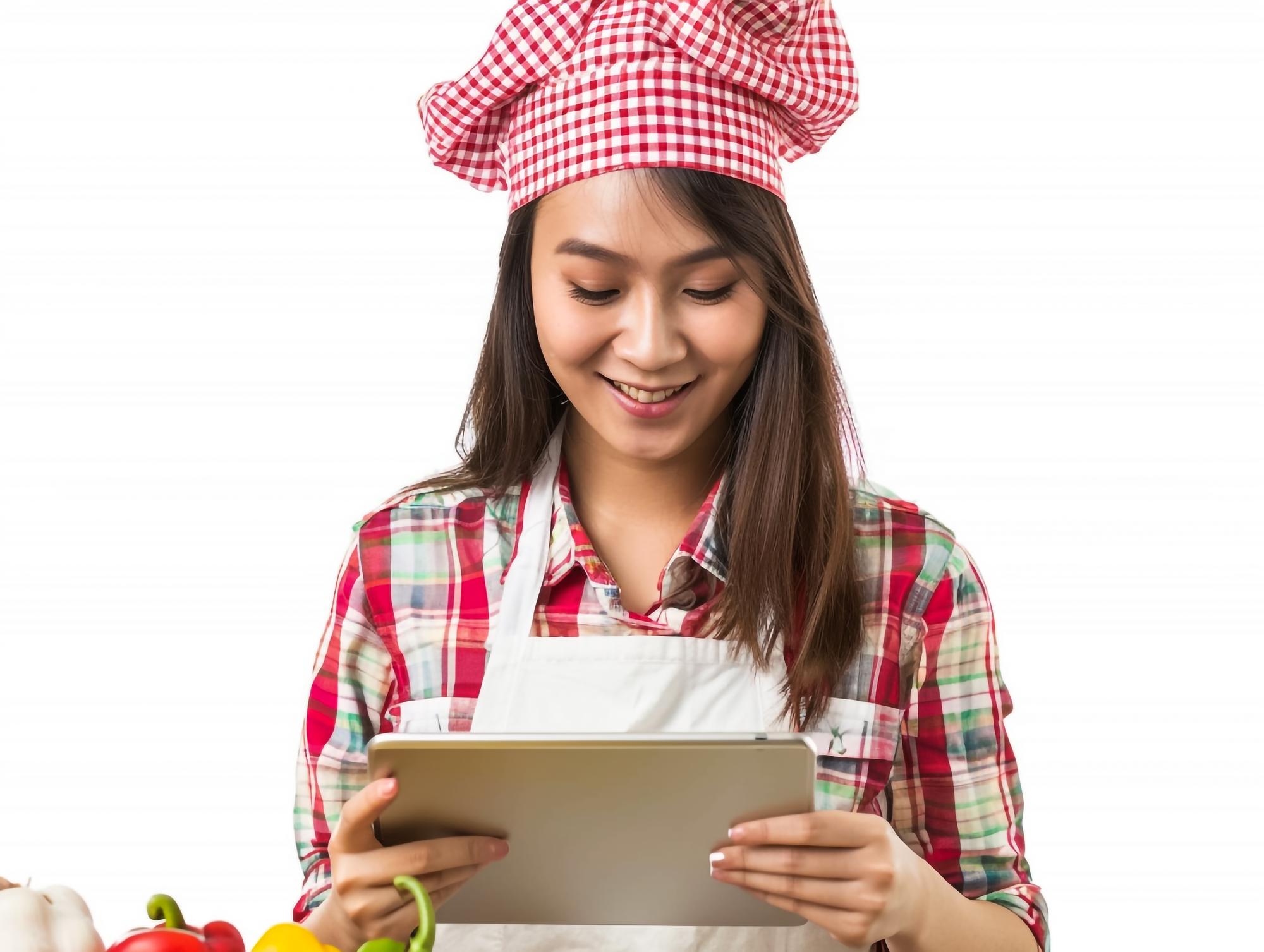 Student cooking on a tablet-led lesson